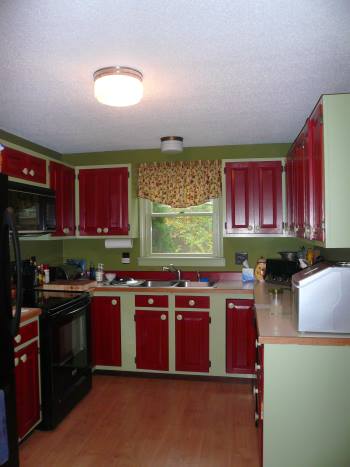 kitchen valance with red cabinet doors
